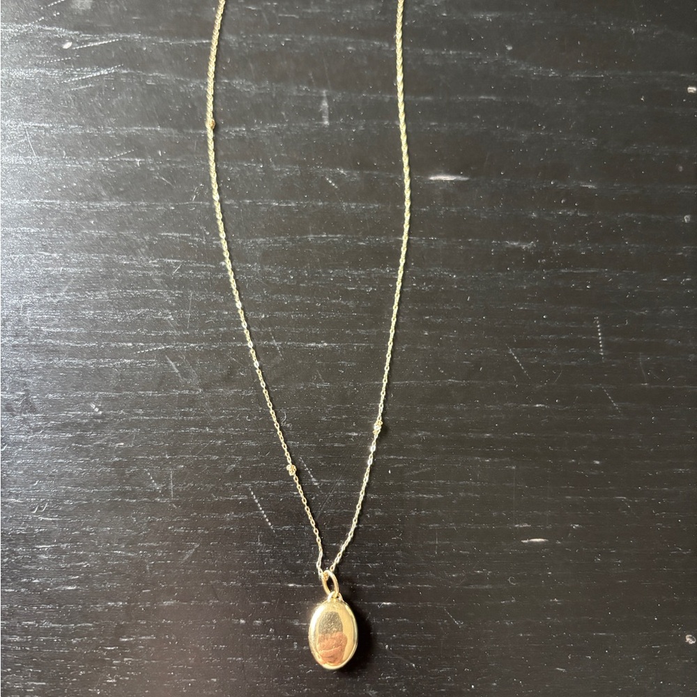Elegant Solid Gold Oval Locket Pendant Necklace